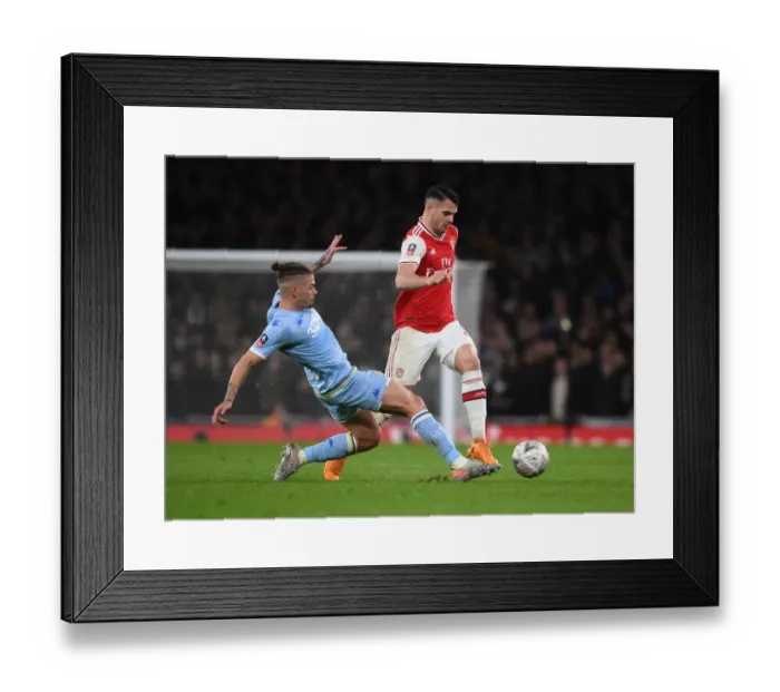 Framed Print : Arsenal's Granit Xhaka Outmaneuvers Leeds Kalvin Phillips in FA Cup Clash Framed Print : Arsenal's Granit Xhaka Outmaneuvers Leeds Kalvin Phillips in FA Cup Clash
