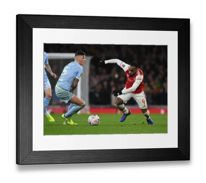 Framed Print : Alexis Lacazette Outsmarts Ben White: Arsenal's FA Cup Triumph Over Leeds Framed Print : Alexis Lacazette Outsmarts Ben White: Arsenal's FA Cup Triumph Over Leeds