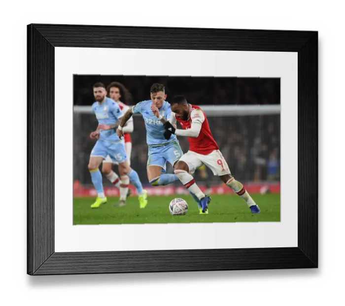 Framed Print : Arsenal's Alex Lacazette Outmaneuvers Leeds Ben White in FA Cup Clash