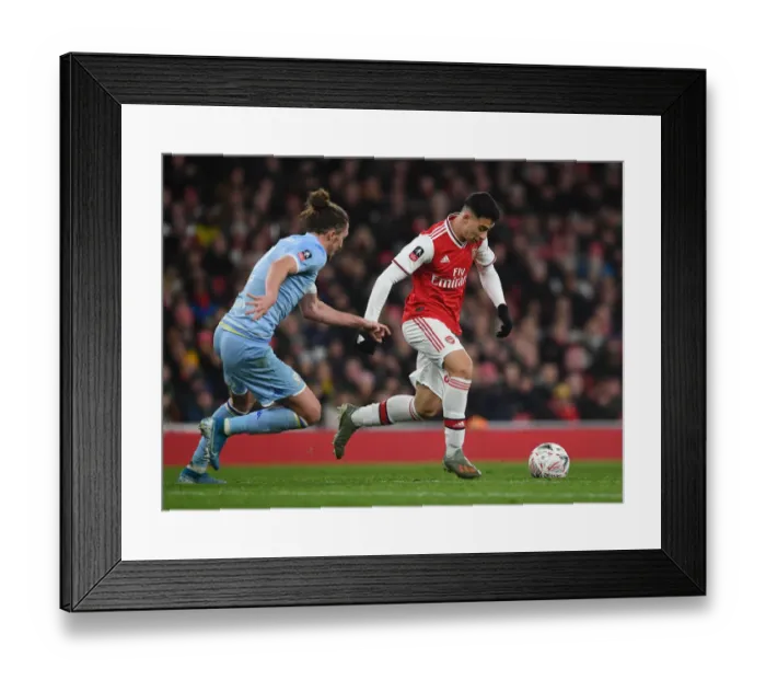 Framed Print : Arsenal's Gabriel Martinelli Clashes with Leeds Luke Ayling in FA Cup Showdown Framed Print : Arsenal's Gabriel Martinelli Clashes with Leeds Luke Ayling in FA Cup Showdown