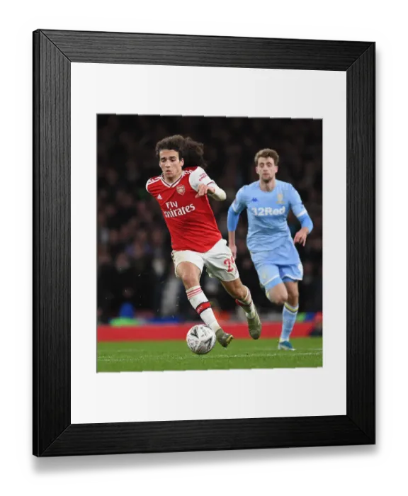 Framed Print : Arsenal's Matteo Guendouzi in Action Against Leeds United in FA Cup Third Round Framed Print : Arsenal's Matteo Guendouzi in Action Against Leeds United in FA Cup Third Round