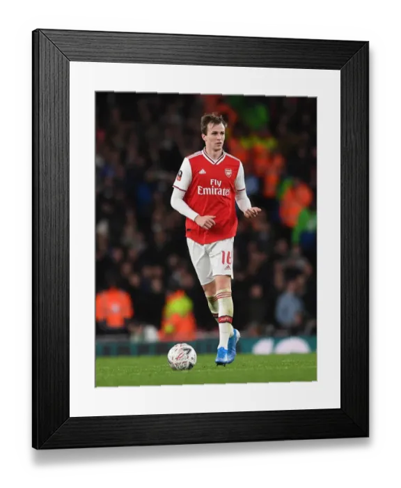 Framed Print : Rob Holding's Intense Concentration: Arsenal vs Leeds United FA Cup Clash Framed Print : Rob Holding's Intense Concentration: Arsenal vs Leeds United FA Cup Clash