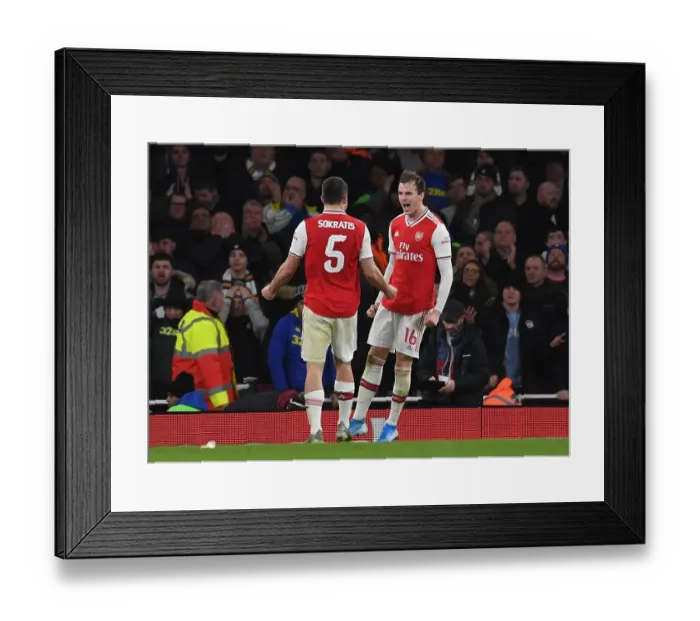 Framed Print : Arsenal's Sokratis and Rob Holding in Action: Arsenal vs. Leeds United, FA Cup Third Round