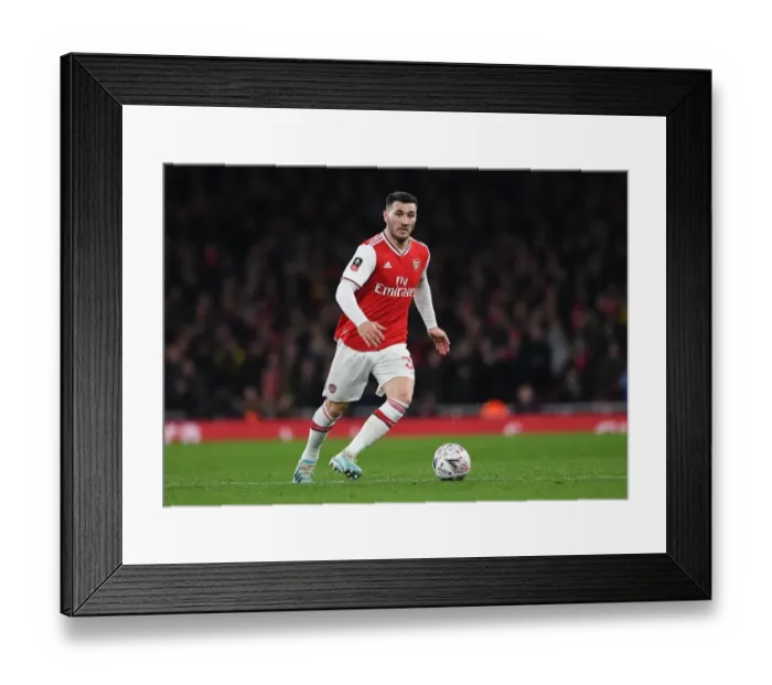 Framed Print : Arsenal's Kolasinac Stands Firm: Arsenal vs Leeds United in FA Cup Battle
