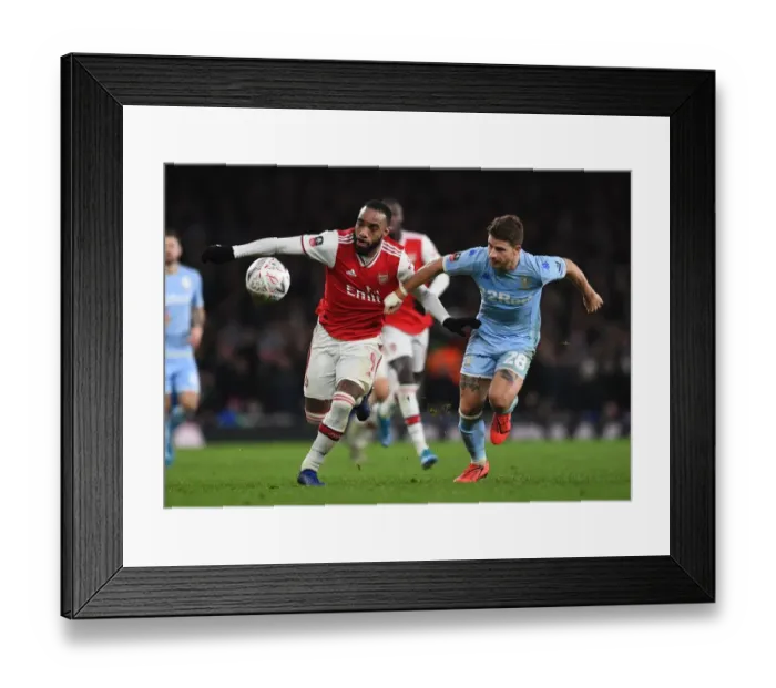 Framed Print : Arsenal's Lacazette Clashes with Leeds Berardi in FA Cup Showdown Framed Print : Arsenal's Lacazette Clashes with Leeds Berardi in FA Cup Showdown