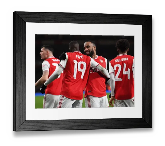 Framed Print : Arsenal's Lacazette and Pepe Celebrate Goal Against Leeds United in FA Cup Third Round