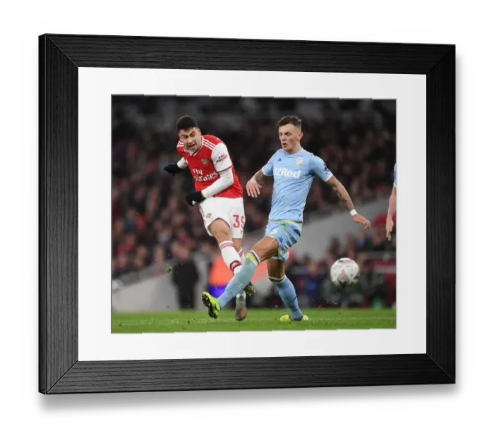 Framed Print : Arsenal's Martinelli Scores Under Pressure Against Leeds United in FA Cup Third Round