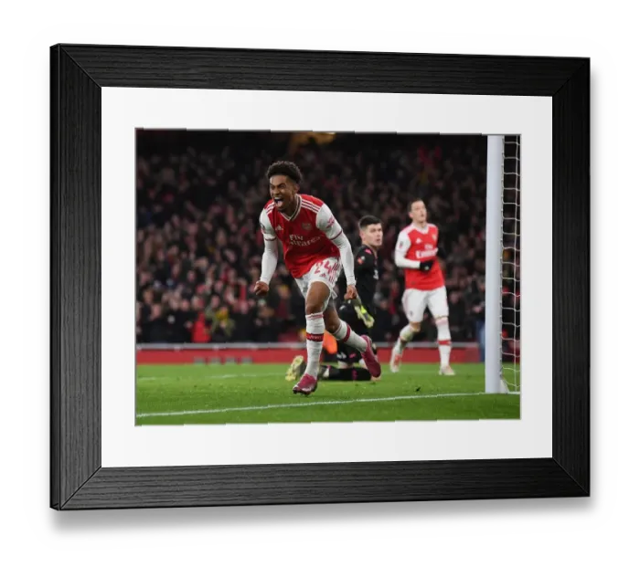 Framed Print : Reiss Nelson Scores the Game-Winning Goal: Arsenal Advances in FA Cup against Leeds United