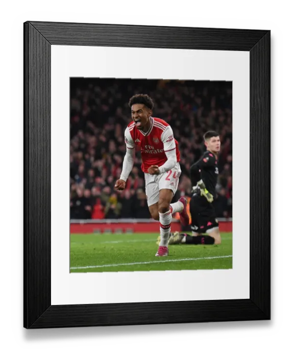 Framed Print : Reiss Nelson Scores the Thrilling Winner: Arsenal Advances in FA Cup against Leeds United