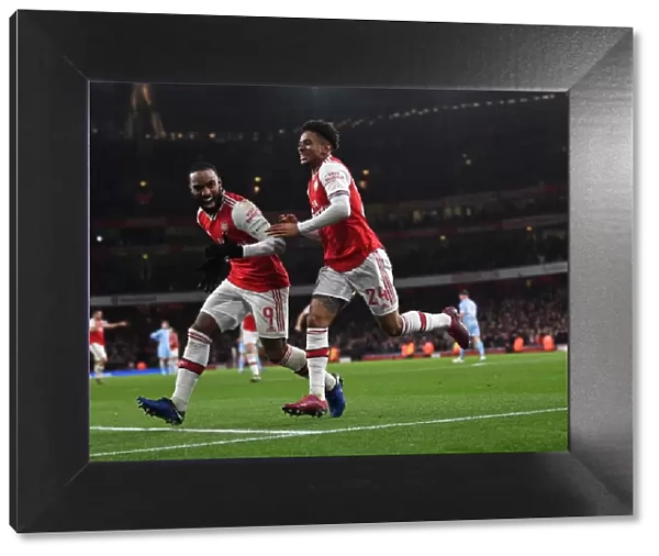 Arsenal's Reiss Nelson and Alexandre Lacazette Celebrate Goal Against Leeds United in FA Cup Third Round