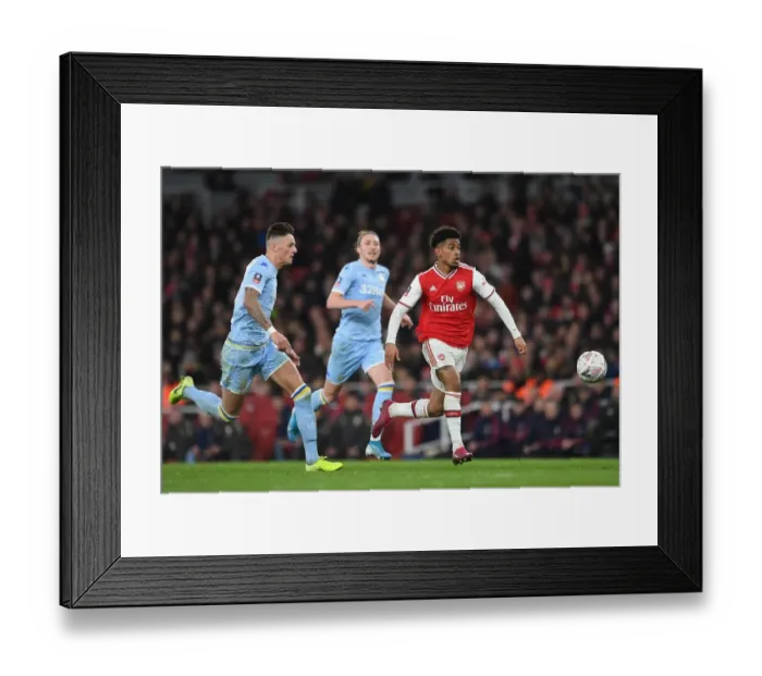 Framed Print : Arsenal's Reiss Nelson Shines in FA Cup Clash Against Leeds United Framed Print : Arsenal's Reiss Nelson Shines in FA Cup Clash Against Leeds United