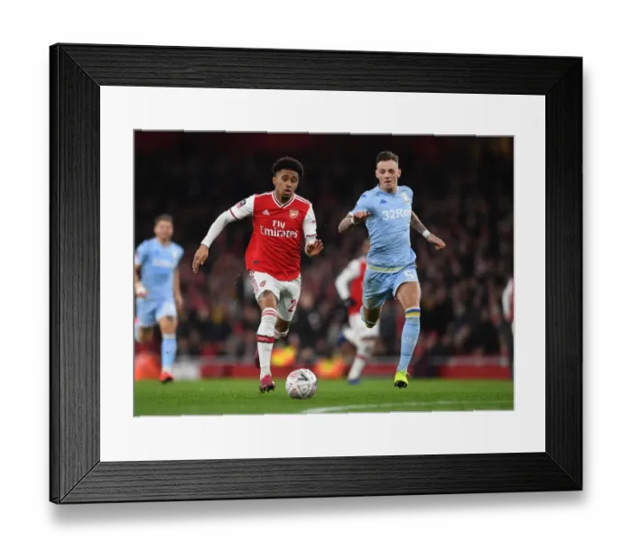 Framed Print : Arsenal vs Leeds United: Nelson vs White Duel - FA Cup Clash at Emirates Framed Print : Arsenal vs Leeds United: Nelson vs White Duel - FA Cup Clash at Emirates