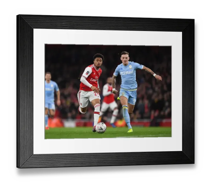Framed Print : Arsenal vs Leeds United: FA Cup Clash - Reiss Nelson vs Ben White Duel