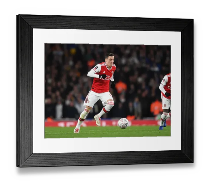 Framed Print : Arsenal's Mesut Ozil in Action against Leeds United in FA Cup Third Round Framed Print : Arsenal's Mesut Ozil in Action against Leeds United in FA Cup Third Round