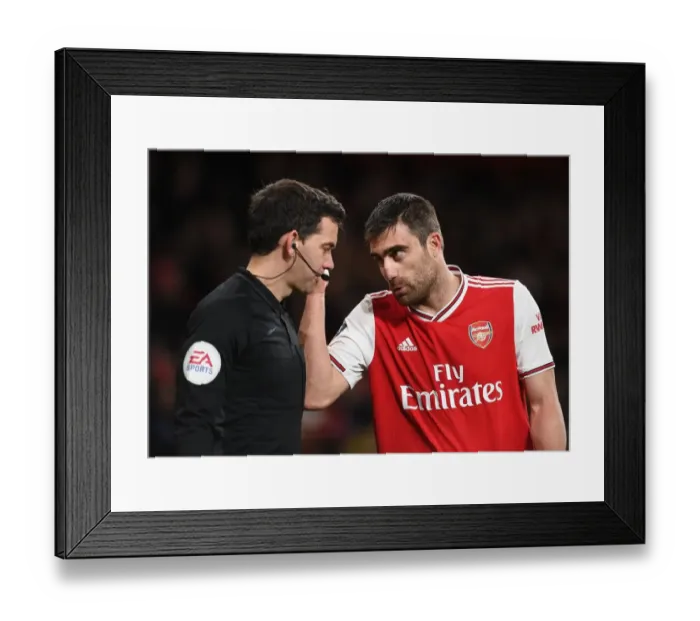 Framed Print : Arsenal's Sokratis in Deep Discussion with FA Cup Linesman: A Pivotal Moment during Arsenal vs Leeds United Framed Print : Arsenal's Sokratis in Deep Discussion with FA Cup Linesman: A Pivotal Moment during Arsenal vs Leeds United