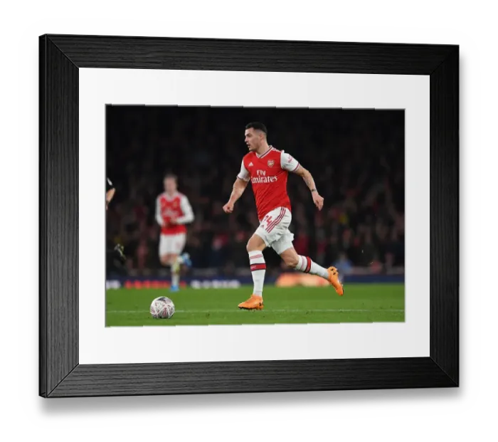 Framed Print : Granit Xhaka: Arsenal vs Leeds United FA Cup Showdown Framed Print : Granit Xhaka: Arsenal vs Leeds United FA Cup Showdown