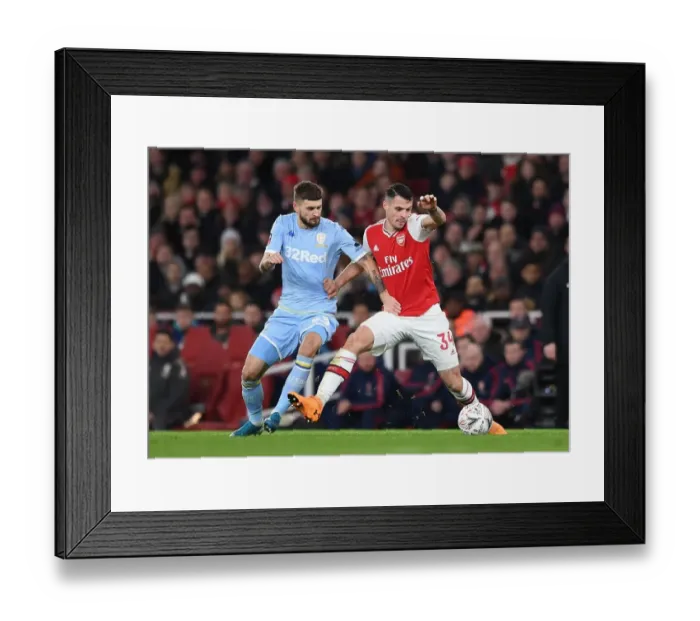 Framed Print : Battle of Midfield Titans: Xhaka vs Klich - Arsenal vs Leeds United, FA Cup Showdown