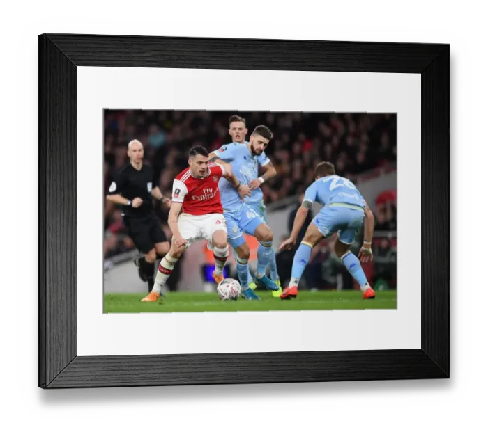 Framed Print : Midfield Showdown: Xhaka vs Klich - Arsenal vs Leeds United, FA Cup Clash Framed Print : Midfield Showdown: Xhaka vs Klich - Arsenal vs Leeds United, FA Cup Clash