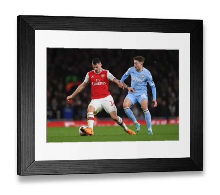 Framed Print : Xhaka vs Stevens: FA Cup Clash at Emirates Stadium Framed Print : Xhaka vs Stevens: FA Cup Clash at Emirates Stadium