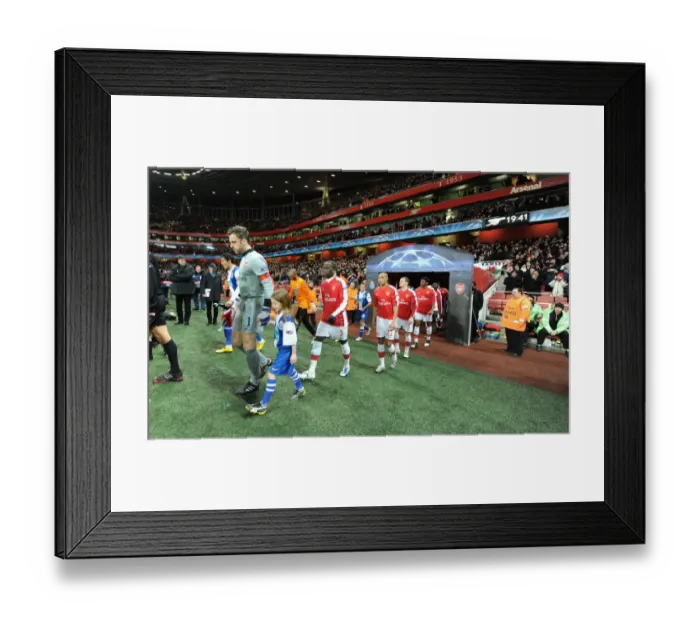 Framed Print : Arsenal captain Manuel Almunia followed by Bacary Sagna and Gael Clichy leads out the team before the match. Arsenal 5: 0 FC Porto, UEFA Champions League First Knockout Round, Second Leg, Emirates Stadium, Arsenal Football Club, London, 9 / 3 / 2010. Credit: Stuart MacFarlane / Arsenal Framed Print : Arsenal captain Manuel Almunia followed by Bacary Sagna and Gael Clichy leads out the team before the match. Arsenal 5: 0 FC Porto, UEFA Champions League First Knockout Round, Second Leg, Emirates Stadium, Arsenal Football Club, London, 9 / 3 / 2010. Credit: Stuart MacFarlane / Arsenal