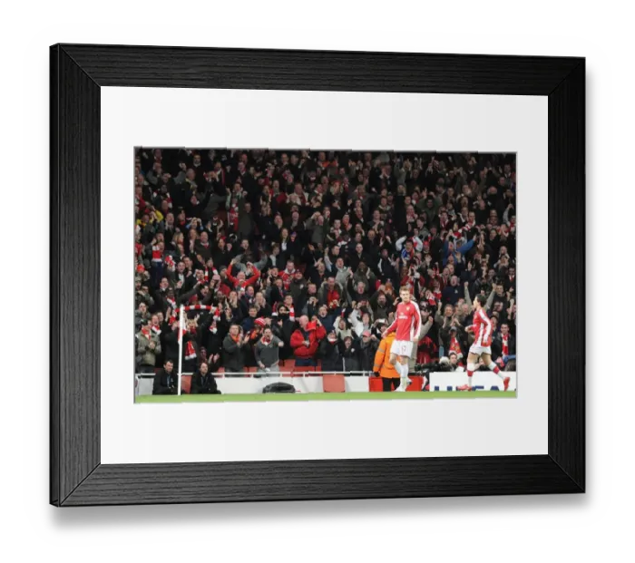 Framed Print : Arsenla fans celebrate the 1st Arsenal goal, scored by Nicklas Bendtner