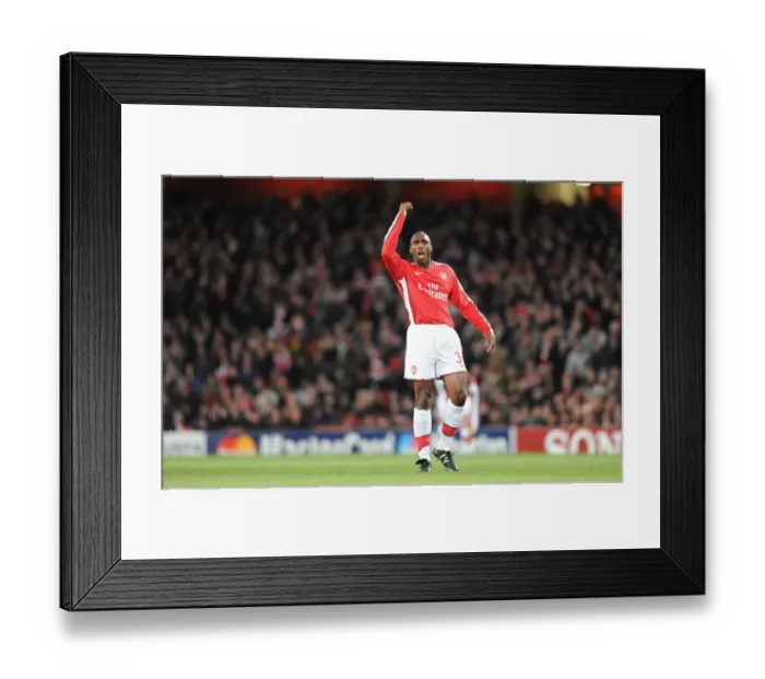 Framed Print : Arsenal's Sol Campbell Leads Historic 5-0 UEFA Champions League Victory over FC Porto Framed Print : Arsenal's Sol Campbell Leads Historic 5-0 UEFA Champions League Victory over FC Porto