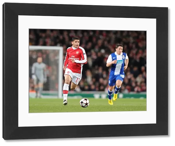 Denilson (Arsenal) Cristian Rodriguez (Porto). Arsenal 5: 0 FC Porto, UEFA Champions League First Knockout Round, Second Leg, Emirates Stadium, Arsenal Football Club, London, 9  /  3  /  2010. Credit : Stuart MacFarlane  / 