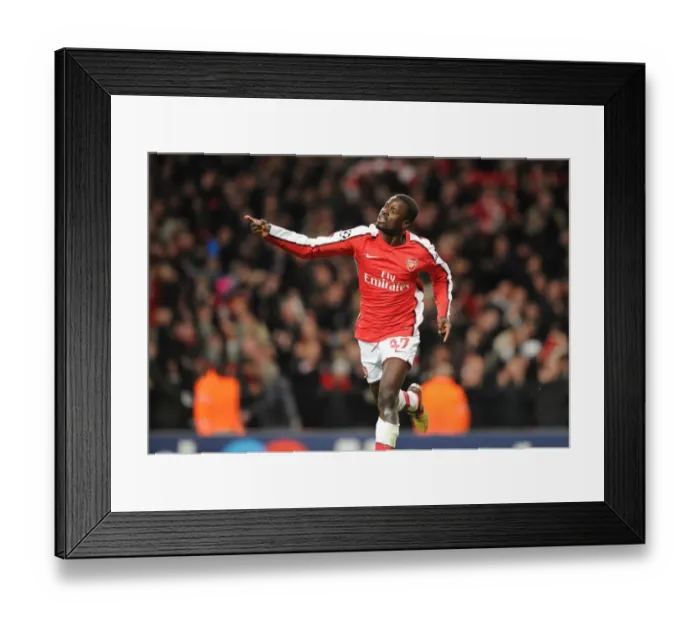 Framed Print : Emmanuel Eboue's Goal Celebration: Arsenal's 4th Goal vs FC Porto in the UEFA Champions League (5-0 Victory) Framed Print : Emmanuel Eboue's Goal Celebration: Arsenal's 4th Goal vs FC Porto in the UEFA Champions League (5-0 Victory)
