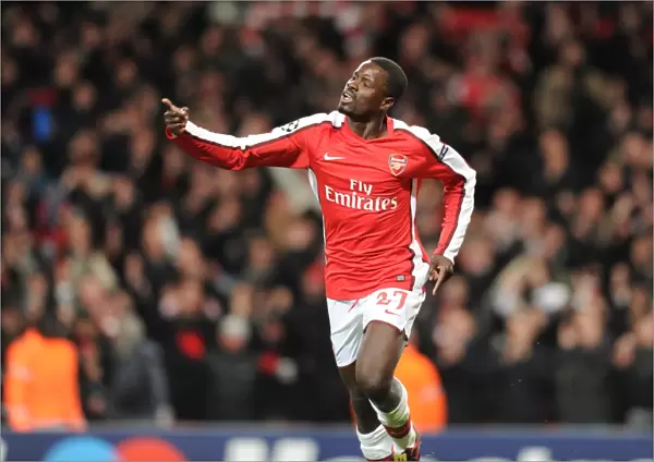 Emmanuel Eboue celebrates scoring the 4th Arsenal goal. Arsenal 5: 0 FC Porto