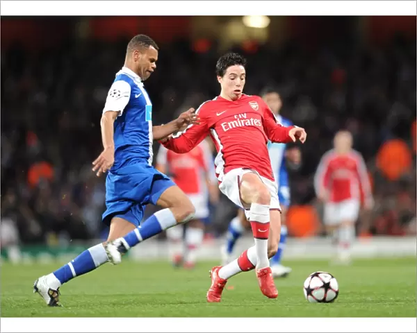 Samir Nasri (Arsenal) Rolando (Porto). Arsenal 5: 0 FC Porto, UEFA Champions League First Knockout Round, Second Leg, Emirates Stadium, Arsenal Football Club, London, 9  /  3  /  2010. Credit : Stuart MacFarlane  / 