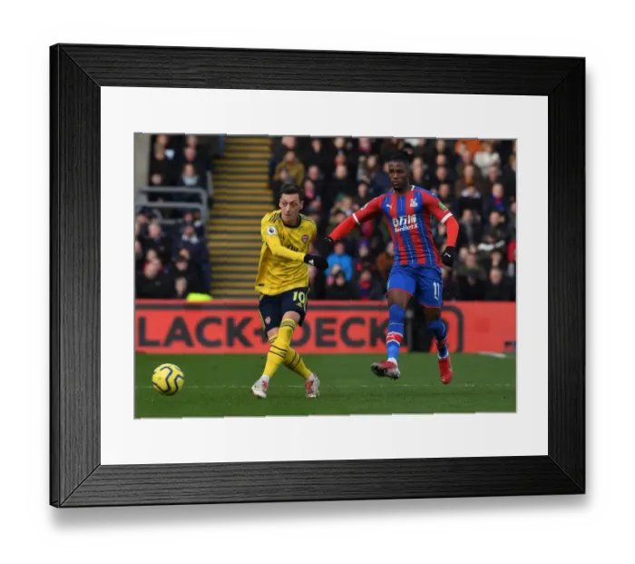 Framed Print : Mesut Ozil Under Pressure: A Tense Battle at Selhurst Park - Crystal Palace vs. Arsenal, Premier League 2019-20