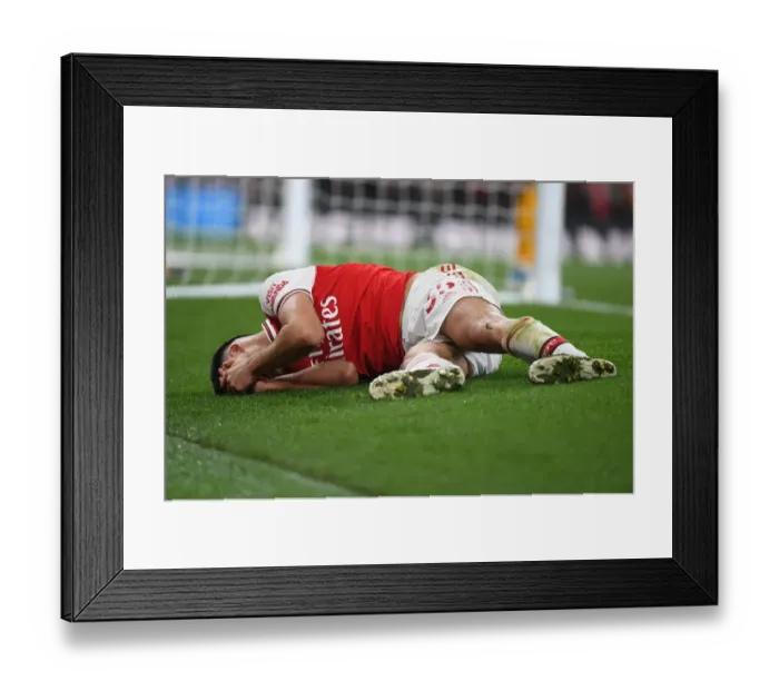 Framed Print : Arsenal's Gabriel Martinelli Suffers Injury Against Sheffield United in Premier League Clash Framed Print : Arsenal's Gabriel Martinelli Suffers Injury Against Sheffield United in Premier League Clash