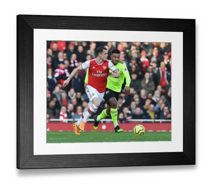 Framed Print : Granit Xhaka Breaks Past Lys Mousset: Arsenal vs Sheffield United, Premier League 2019-20 Framed Print : Granit Xhaka Breaks Past Lys Mousset: Arsenal vs Sheffield United, Premier League 2019-20