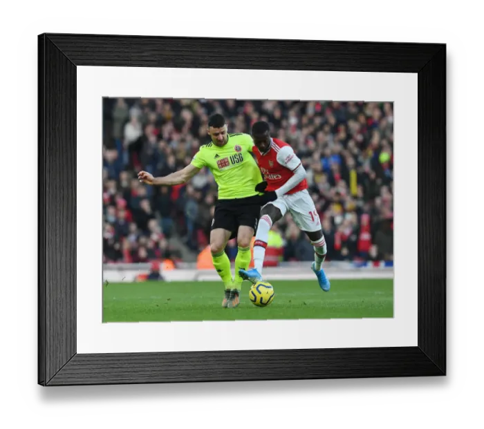 Framed Print : Pepe Outwits Stevens: Arsenal's Star Winger Dazzles in Premier League Clash Framed Print : Pepe Outwits Stevens: Arsenal's Star Winger Dazzles in Premier League Clash