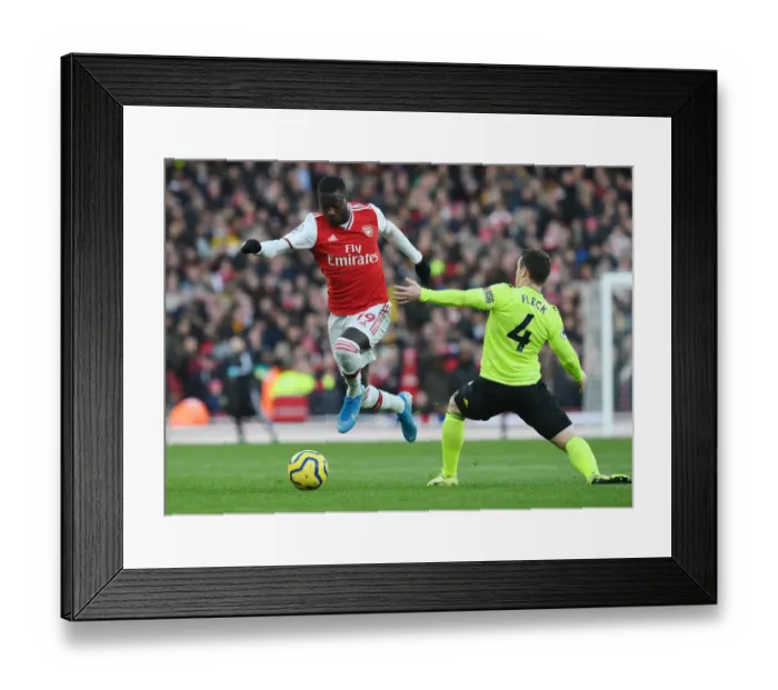 Framed Print : Arsenal's Nicolas Pepe Outmaneuvers Sheffield United's John Fleck during the Premier League Clash Framed Print : Arsenal's Nicolas Pepe Outmaneuvers Sheffield United's John Fleck during the Premier League Clash