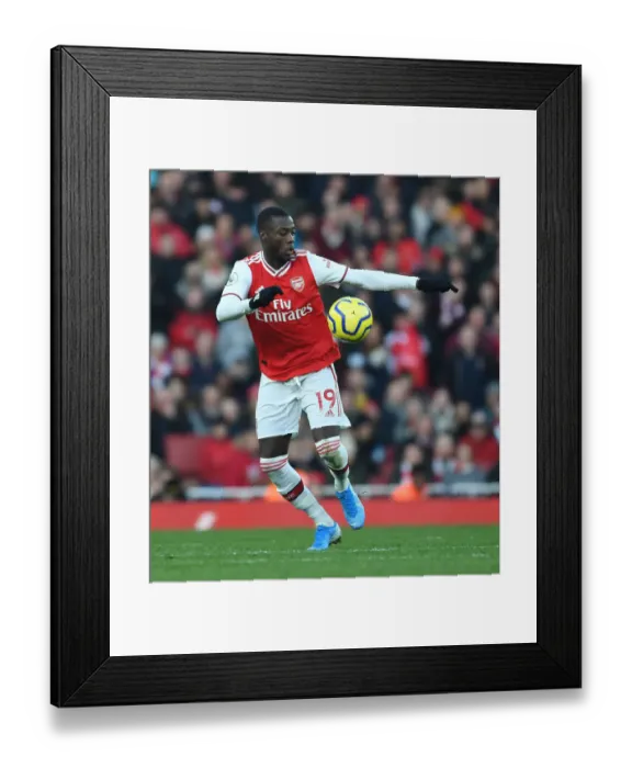 Framed Print : Arsenal's Nicolas Pepe in Action against Sheffield United, Premier League 2019-20