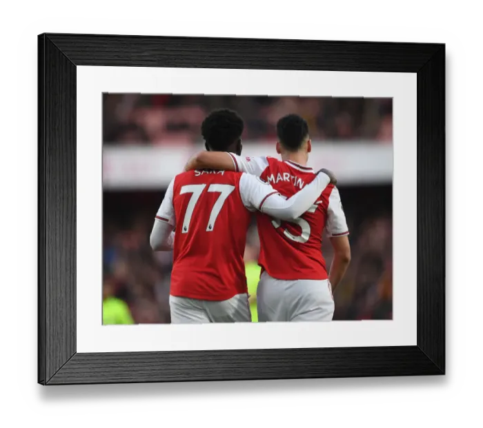Framed Print : Arsenal's Saka and Martinelli in Action: A Premier League Battle at Emirates Stadium