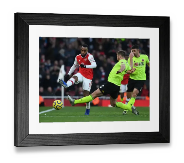 Framed Print : Lacazette vs. O'Connell: A Battle of Wits in the Arsenal vs. Sheffield United Premier League Clash Framed Print : Lacazette vs. O'Connell: A Battle of Wits in the Arsenal vs. Sheffield United Premier League Clash