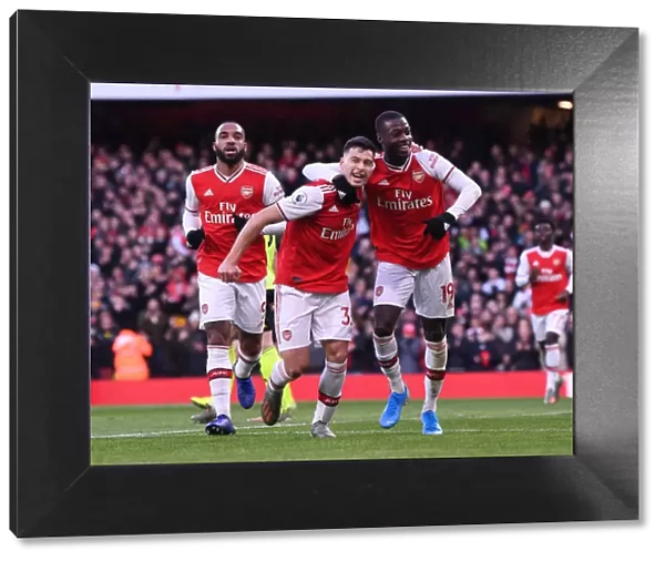 Martinelli and Pepe's Jubilant Moment: Arsenal's Thrilling Victory over Sheffield United (2019-20)