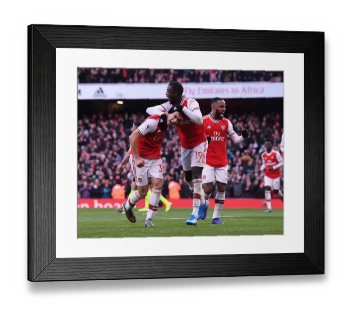 Framed Print : Triumphant Arsenal Trio: Martinelli, Lacazette, and Pepe Celebrate Goal Against Sheffield United (2019-20)