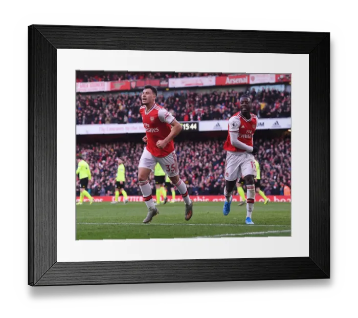 Framed Print : Arsenal's Martinelli and Pepe Celebrate Goal Against Sheffield United, Premier League 2019-20