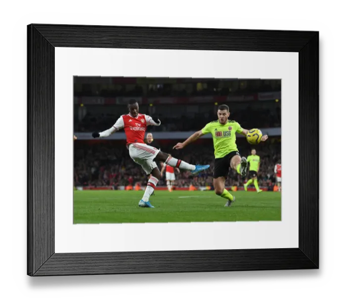 Framed Print : Arsenal's Eddie Nketiah Faces Off Against Sheffield United's Jack O'Connell in Intense Premier League Showdown Framed Print : Arsenal's Eddie Nketiah Faces Off Against Sheffield United's Jack O'Connell in Intense Premier League Showdown