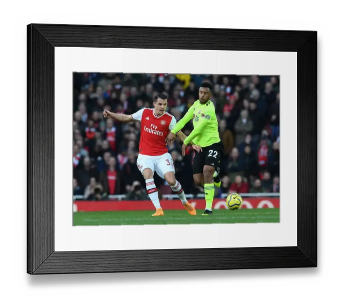 Framed Print : Xhaka Under Fire: Intense Pressure from Mousset in Arsenal vs. Sheffield United Clash Framed Print : Xhaka Under Fire: Intense Pressure from Mousset in Arsenal vs. Sheffield United Clash