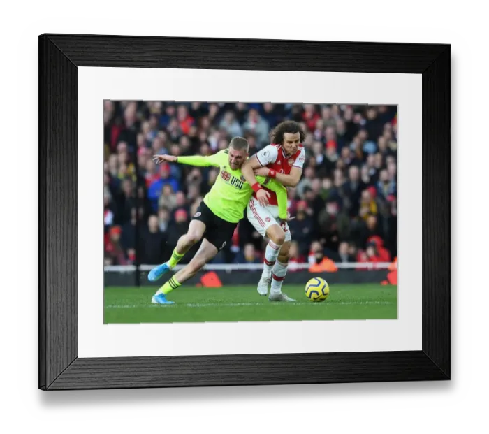 Framed Print : Arsenal vs Sheffield United: David Luiz Clashes with Oli McBurnie in Premier League Showdown