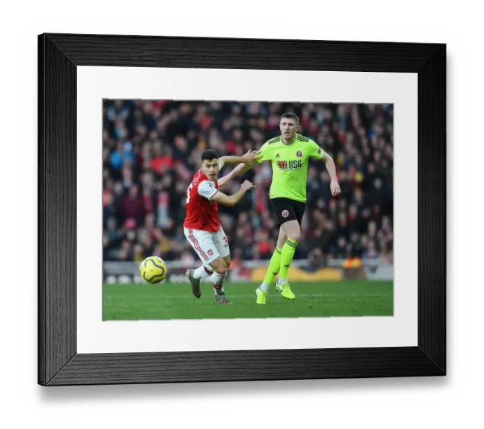 Framed Print : Arsenal vs Sheffield United: Gabriel Martinelli Clashes with John Lundstram in Premier League Showdown Framed Print : Arsenal vs Sheffield United: Gabriel Martinelli Clashes with John Lundstram in Premier League Showdown