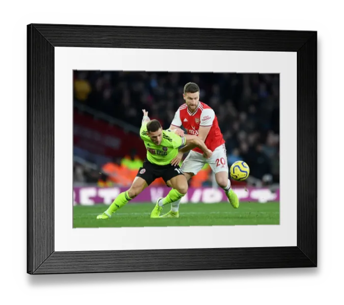 Framed Print : Arsenal vs Sheffield United: Mustafi Clashes with Sharp in Premier League Showdown Framed Print : Arsenal vs Sheffield United: Mustafi Clashes with Sharp in Premier League Showdown
