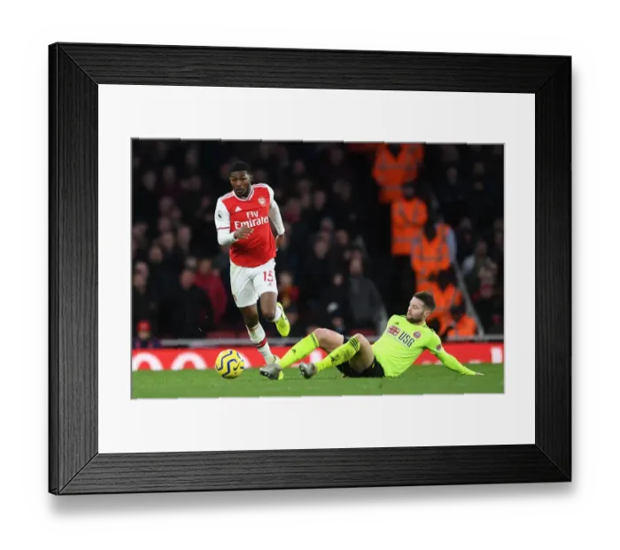 Framed Print : Maitland-Niles Outsmarts Norwood: Arsenal's Midfield Masterclass vs Sheffield United