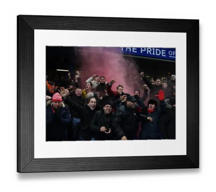 Framed Print : Arsenal Fans Ecstatic: First Goal Against Chelsea in Premier League Showdown