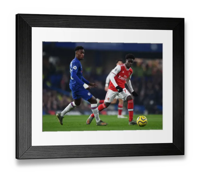 Framed Print : London Rivals Clash: Saka vs. Hudson-Odoi - Premier League Showdown at Stamford Bridge Framed Print : London Rivals Clash: Saka vs. Hudson-Odoi - Premier League Showdown at Stamford Bridge