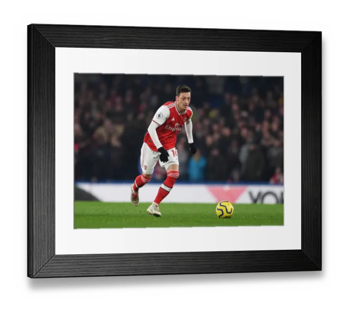 Framed Print : Mesut Ozil in Action: Premier League Clash between Chelsea and Arsenal, 2019-2020 Framed Print : Mesut Ozil in Action: Premier League Clash between Chelsea and Arsenal, 2019-2020